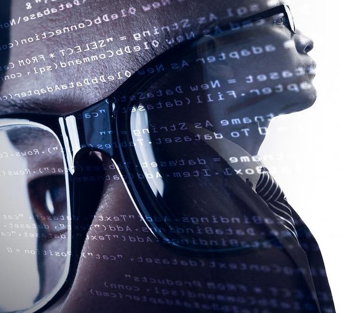 Business professional glasses looking at computer screen